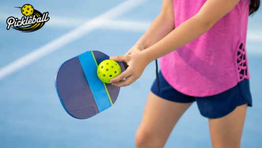 Girl playing pickleball