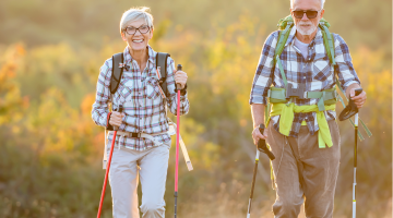 2 people walking with activator poles